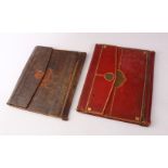 TWO 17TH CENTURY TURKISH OTTOMAN OR PERSIAN TOOLED LEATHER BOOK BINDINGS, 31CM X 24CM & 28.5 X