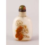 A GOOD CHINESE LATE 19TH CENTURY CARVED AGATE SNUFF BOTTLE, the bottle carved to depict a