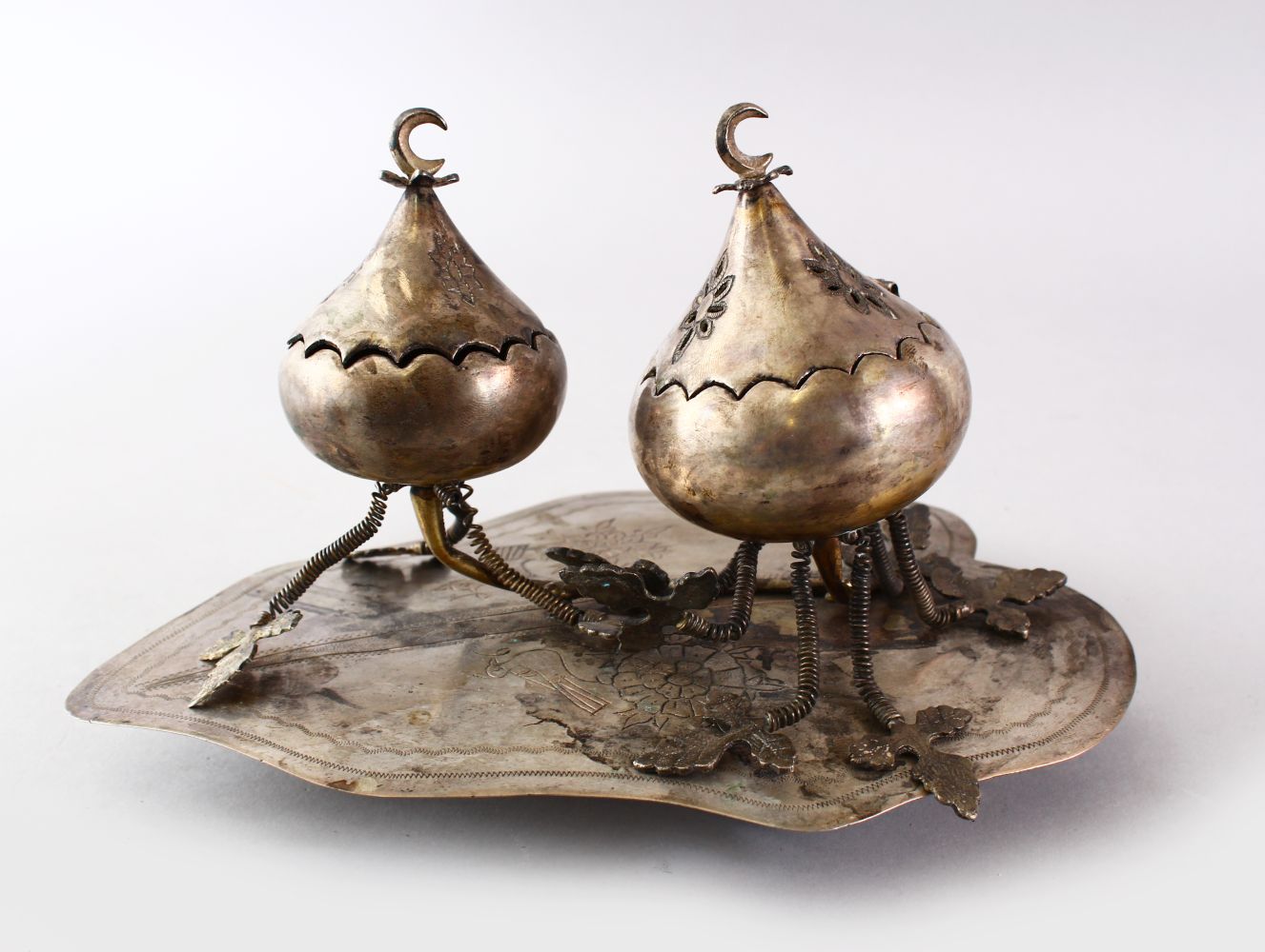 A POSSIBLY OTTOMAN WHITE METAL INCENSE BURNER, 14cm high x 24cm wide.