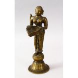 AN 19TH CENTURY SOUTH INDIAN BRONZE OIL LAMP FIGURE OF A LADY, the lady depicted holding a tray,