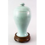 A GOOD CHINESE SONG STYLE RUYAO PORCELAIN VASE ON BRONZE STAND, the shoulder with a ribbed design