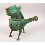 A LARGE METALWORK KHORASHAN STYLE BRONZE INCENSE BURNER IN THE FORM OF A LION, with openwork