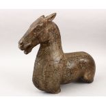 A GOOD POSSIBLY TANG DYNASTY CARVED POTTERY MODEL OF A HORSE BUST, with its head aloft and its mouth