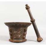 A DECORATIVE CAST IRON PESTLE AND MORTAR. 4.5ins high.