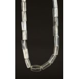 A LONG ROMAN-TYPE GLASS NECKLACE.