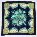 A GUCCI BLUE SILK SCARF, with flowers.