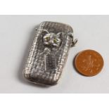 A CAST SILVER NOVELTY CAT IN A BASKET VESTA.