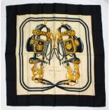 A HERMES SILK SCARF, in a long orange box.