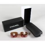 A PAIR OF CHANEL SUNGLASSES, No. 4017 C.124/77 62017 120, in a black leather case and Chanel box.