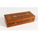 A TUNBRIDGE WARE MARQUETRY AND PARQUETRY LONG BOX, with lift-up lid. 9ins long x 3.5ins wide x