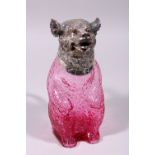 A RUBY GLASS AND PLATE BEAR DECANTER.