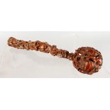 A CHINESE CARVED ROOTWOOD RUYI SCEPTRE. 14ins long.