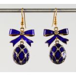 A PAIR OF RUSSIAN FABERGE DESIGN BLUE ENAMEL EGG SHAPED EARRINGS.