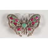A SILVER, RUBY AND EMERALD BUTTERFLY BROOCH.
