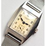 A J. W. BENSON GENTLEMAN'S ART DECO WRISTWATCH, with stainless steel case and later bracelet strap.
