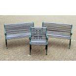 A PAIR OF VICTORIAN STYLE GARDEN BENCHES, each with ornate cast metal ends and wooden slats;