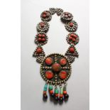 A LARGE ROMAN-TYPE SILVER BRASS, CORAL SET AND ENAMEL CHATELAINE.