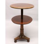 A 19TH CENTURY MAHOGANY CIRCULAR RISE AND FALL DUMB-WAITER, plain top on a turned column with