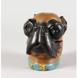 A PAINTED COLD CAST PUG DOG INKSTAND. 3ins high.