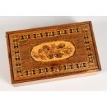 A TUNBRIDGE WARE MARQUETRY AND PARQUETRY BOX, the hinged lid inlaid with roses. 6.25ins long.