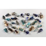 A COLLECTION OF THIRTY ROMAN-TYPE GLASS MINIATURES.