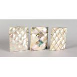 THREE VICTORIAN MOTHER-OF-PEARL CALLING CARD CASES. 4ins x 3ins.