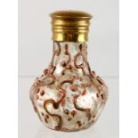 A SMALL BULBOUS SCENT BOTTLE with gilt stopper. 3ins high.