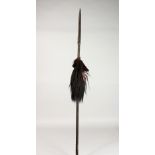 A POLYNESIAN CARVED HARDWOOD SPEAR. 78ins long.