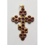 A SMALL RUSSIAN SILVER AND GARNET CRUCIFIX. 1.75ins long.