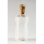 AN ENGRAVED 18CT GOLD TOP SCENT BOTTLE. 3.5ins long.