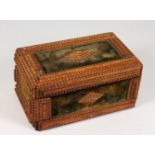 A 19TH CENTURY GEOMETRICALLY CARVED WOOD CASKET, with velvet lined panels. 11.5ins wide.