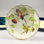 A SET OF TWELVE ROYAL WORCESTER PLATES "THE BIRDS OF DOROTHY DOUGHTY", Limited Edition, various