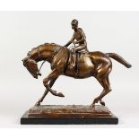A GOOD HORSE AND JOCKEY. Fred Archer on the Queens horse, on a rectangular base with black marble