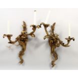 A PAIR OF BRONZE ROCOCO STYLE TWIN-BRANCH WALL APPLIQUES.