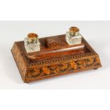 A GOOD TUNBRIDGE WARE MARQUETRY AND PARQUETRY TABLE INKSTAND, inlaid with scrolls and flowers, inset