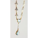 A 9CT GOLD, TOPAZ AND DIAMOND NECKLACE.