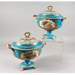 A PAIR OF PORCELAIN TWIN-HANDLED PEDESTAL TUREENS AND COVERS, pale blue ground