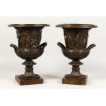 A GOOD PAIR OF CLASSICAL STYLE CAMPAGNE SHAPED URNS, relief moulded with classical figures, on