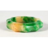 A CHINESE BAMBOO SHAPED JADE BANGLE. 3ins diameter.