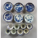 A SMALL COLLECTION OF 19TH CENTURY BLUE AND WHITE PORCELAIN TEA BOWLS AND SAUCERS.