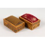 TWO TUNBRIDGE WARE PARQUETRY PIN BOXES, with padded tops. 2.75ins long.