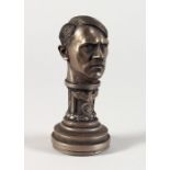 A METAL BUST OF HITLER SEAL. 3ins high.