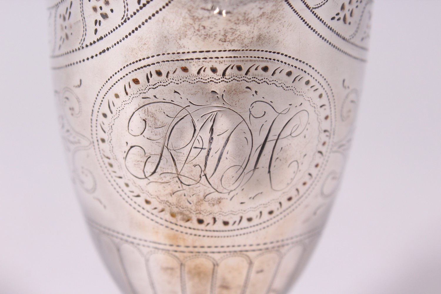 A GOOD GEORGE III ENGRAVED HELMET SHAPED MILK JUG, with reeded handle and base. London 1782. - Image 3 of 9