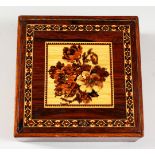 A TUNBRIDGE WARE SQUARE MARQUETRY BOX, the hinged top inlaid with roses. 6ins square.