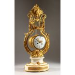 A GOOD LOUIS XVI ORMOLU AND WHITE MARBLE LYRE SHAPED CLOCK, with eight-day drum movement, sunburst
