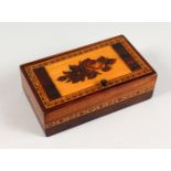 A TUNBRIDGE WARE RECTANGULAR MARQUETRY BOX, with hinged lid. 5.5ins long.