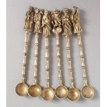 SIX CHINESE WHITE METAL FIGURAL SPOONS. 4ins long.