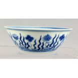 A CHINESE BLUE AND WHITE BOWL. Six character mark. 5.5ins diameter.