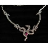 A GOOD SILVER MARCASITE AND RUBY SET SNAKE NECKLACE.