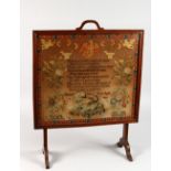 A 19TH CENTURY SAMPLER, with text and a border of floral designs, animals, etc., signed and dated,